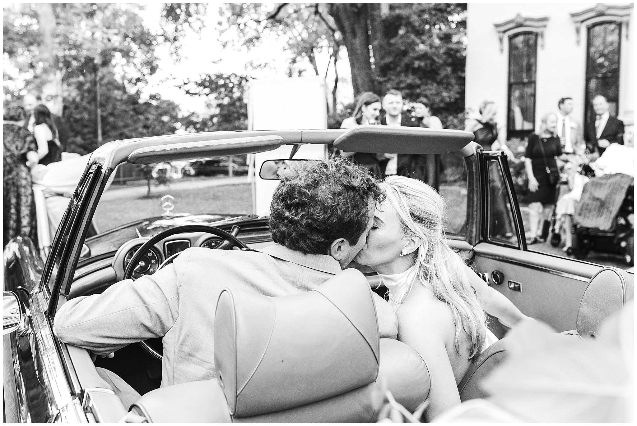 Bride and Groom in car in front of Peterson-Dumesnil House
